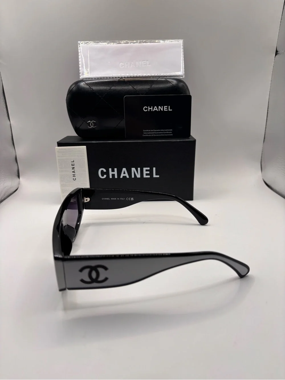 CHANEL Black Shield Sunglasses with Purple Gradient Lenses